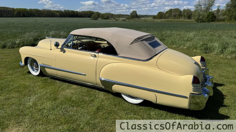 Convertible. Old body with modern drivetrain. 350 V8 / 700 automatic. Air ride. Disc brakes.