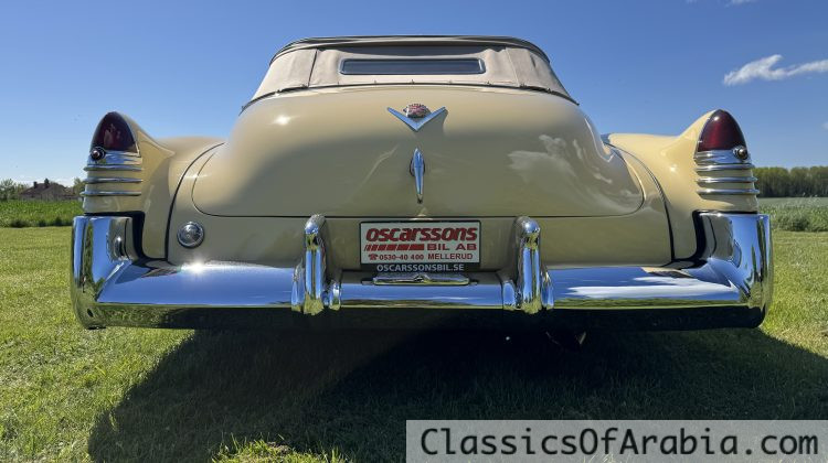 Convertible. Old body with modern drivetrain. 350 V8 / 700 automatic. Air ride. Disc brakes.